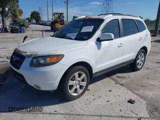 2007 Hyundai Santa Fe SE with VIN 5NMSH13EX7H052857, listed as a IAAI auction lot 42548659 with 136,445 mi miles and . Bid and sale history available at DreamBid. Image 2.