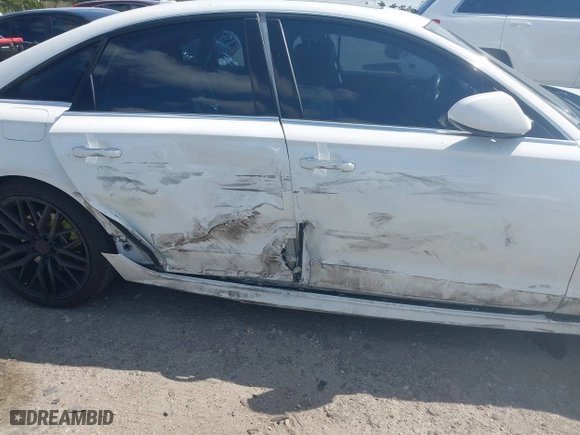 2016 Audi A6 3.0T Premium Plus with VIN WAUFGAFC9GN003664, listed as a IAAI auction lot 41890962 with 100,485 mi miles. Bid and sale history available at carsss.com. Image 6.
