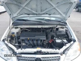 2004 Toyota Corolla CE with VIN JTDBR32E440052035, listed as a IAAI auction lot 42218301 with 299,999 mi miles. Bid and sale history available at carsss.com. Image 10.