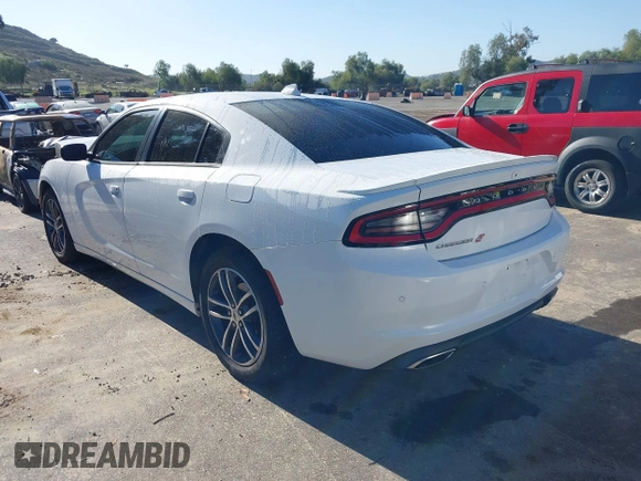 2019 Dodge Charger SXT with VIN 2C3CDXJGXKH533322, listed as a IAAI auction lot 41808838 with 95,877 mi miles and . Bid and sale history available at DreamBid. Image 3.