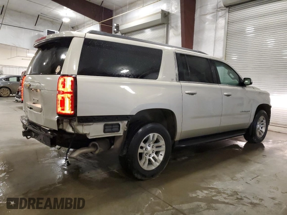 2017 Chevrolet Suburban LT with VIN 1GNSKHKC3HR381480, listed as a Copart auction lot 53789925 with 142,392 mi miles and Salvage Title. Bid and sale history available at DreamBid. Image 3.