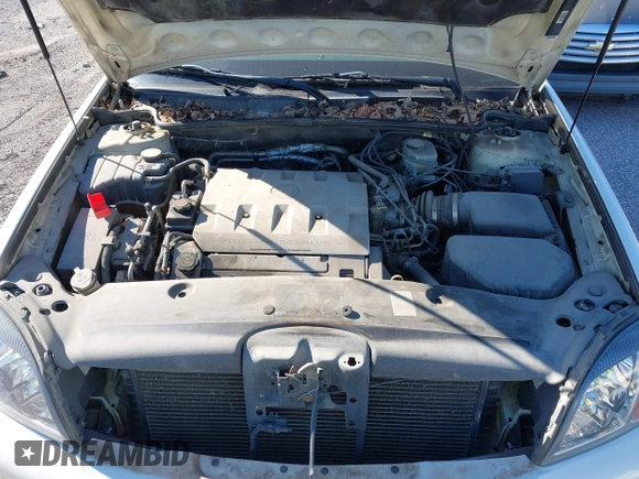 2000 Cadillac DeVille DTS z VIN 1G6KF5793YU222306, wystawiony jako IAAI lot #40810291 z przebiegiem 140 019 mil mil oraz . Historia ofert i sprzedaży dostępna na DreamBid. Obrazek 10.