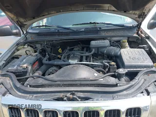 2003 Jeep Grand Cherokee Laredo with VIN 1J4GW48S83C558962, listed as a IAAI auction lot 42415803 with 312,419 mi miles and . Bid and sale history available at DreamBid. Image 10.