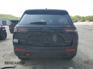 2022 Jeep Grand Cherokee Trailhawk with VIN 1C4RJHCG7N8574289, listed as a Copart auction lot 56333165 with 23,522 mi miles and Salvage title. Bid and sale history available at DreamBid. Image 6.