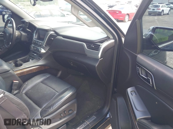 2015 Chevrolet Tahoe LT with VIN 1GNSCBKC1FR615817, listed as a IAAI auction lot 41760474 with 242,148 mi miles and . Bid and sale history available at DreamBid. Image 5.