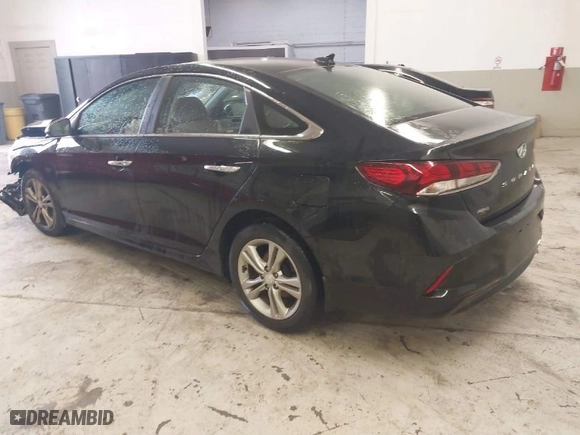 2019 Hyundai Sonata Sport with VIN 5NPE34AF4KH789783, listed as a IAAI auction lot 41082804 with 92,877 mi miles. Bid and sale history available at carsss.com. Image 3.
