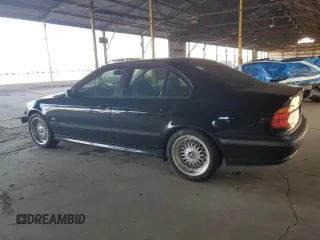 1999 BMW 5 Series 528iA with VIN WBADM6344XBY34517, listed as a Copart auction lot 51803145 with 186,637 mi miles and Salvage Title. Bid and sale history available at carsss.com. Image 2.