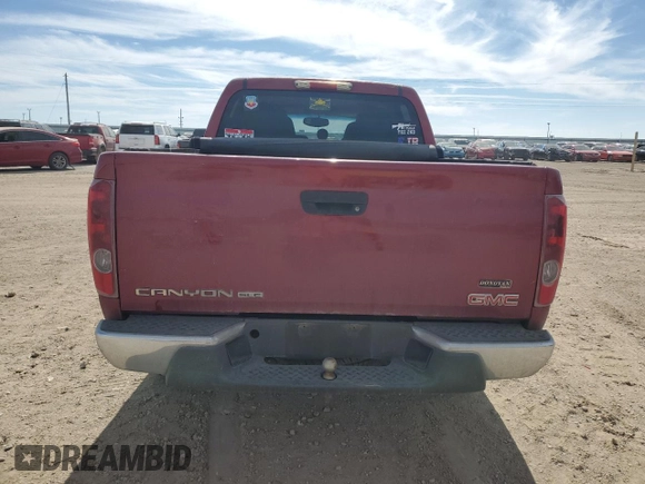 2005 GMC Canyon 1SE SLE Z71 with VIN 1GTDS136158212142, listed as a Copart auction lot 44064815 with 327,579 mi miles and Salvage Title. Bid and sale history available at carsss.com. Image 6.