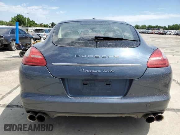 2010 Porsche Panamera Turbo with VIN WP0AC2A70AL090897, listed as a Copart auction lot 60986335 with 120,334 mi miles and Salvage title. Bid and sale history available at DreamBid. Image 6.