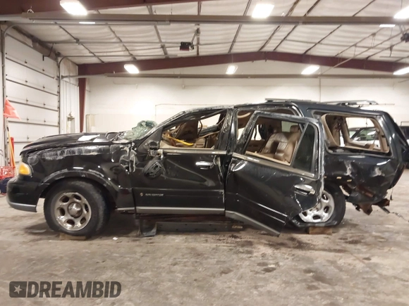 2001 Lincoln Navigator with VIN 5LMFU28A11LJ03590, listed as a IAAI auction lot 42442449 with Not provided miles and . Bid and sale history available at DreamBid. Image 6.