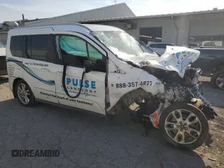 2015 Ford Transit Connect XLT с VIN NM0AE8F79F1205843, выставлен на аукционе Copart как лот 70516794 с пробегом Не указан миль и Списание • Salvage title. История ставок и продаж доступна на DreamBid. Изображение 4.