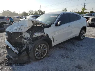 2018 BMW X6 xDrive35i z VIN 5UXKU2C56J0Z61248, wystawiony jako Copart lot #53439225 z przebiegiem 79 498 mil mil oraz Szkody całkowita. Historia ofert i sprzedaży dostępna na DreamBid. Obrazek 1.