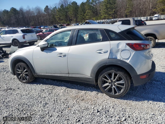 2018 Mazda CX-3 Touring with VIN JM1DKDC78J0325377, listed as a Copart auction lot 89141155 with 202,927 mi miles and Salvage Title. Bid and sale history available at carsss.com. Image 2.