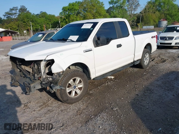 2016 Ford F-150 XLT with VIN 1FTFX1EF4GKE50550, listed as a IAAI auction lot 41974498 with 154,409 mi miles. Bid and sale history available at carsss.com. Image 2.