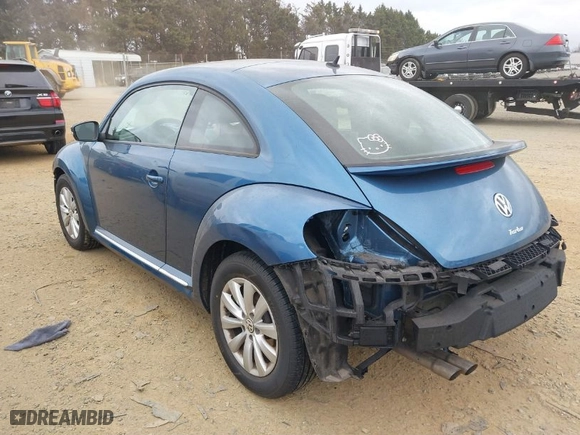 2019 Volkswagen Beetle S with VIN 3VWFD7AT8KM708865, listed as a IAAI auction lot 41692756 with 35,070 mi miles. Bid and sale history available at carsss.com. Image 3.