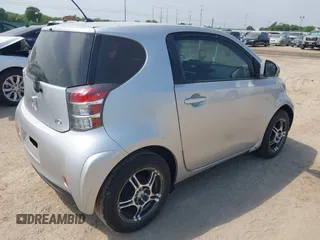 2012 Scion iQ with VIN JTNJJXB02CJ015746, listed as a IAAI auction lot 42266761 with 135,321 mi miles and . Bid and sale history available at DreamBid. Image 4.