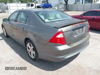 2012 Ford Fusion SE with VIN 3FAHP0HA4CR203446, listed as a IAAI auction lot 42093330 with 185,703 mi miles. Bid and sale history available at carsss.com. Image 3.