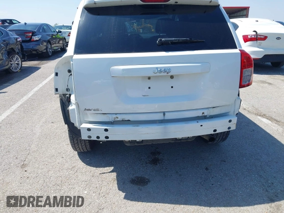 2011 Jeep Compass Latitude with VIN 1J4NT1FB2BD236439, listed as a IAAI auction lot 41935842 with 164,893 mi miles. Bid and sale history available at carsss.com. Image 6.