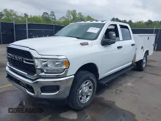 2024 Ram 2500 Tradesman with VIN 3C6UR5HJ1RG114588, listed as a IAAI auction lot 41923877 with 1,800 mi miles and . Bid and sale history available at DreamBid. Image 2.