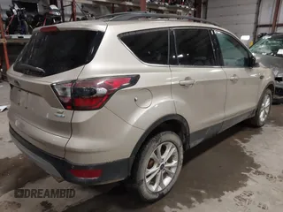 2017 Ford Escape SE with VIN 1FMCU9GDXHUB17048, listed as a IAAI auction lot 41046226 with 79,415 mi miles. Bid and sale history available at carsss.com. Image 4.