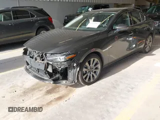 2023 Mazda 3 S Premium with VIN 3MZBPBDM5PM374492, listed as a IAAI auction lot 42025207 with 12,344 mi miles and . Bid and sale history available at DreamBid. Image 6.
