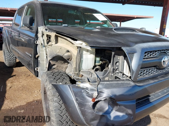 2011 Toyota Tacoma with VIN 3TMMU4FN0BM032561, listed as a IAAI auction lot 41190472 with 188,862 mi miles and . Bid and sale history available at DreamBid. Image 6.