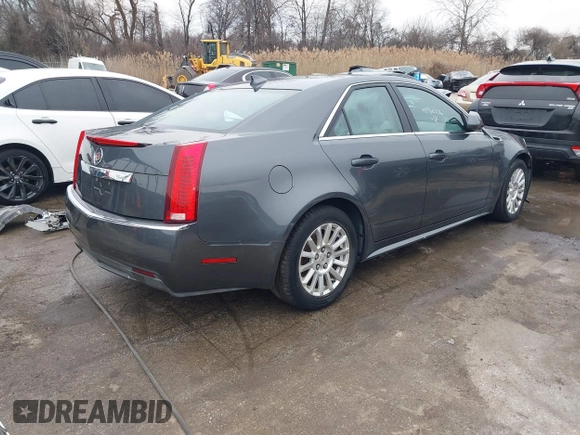 2011 Cadillac CTS Sedan Luxury with VIN 1G6DG5EY7B0163601, listed as a IAAI auction lot 41536256 with 106,523 mi miles. Bid and sale history available at carsss.com. Image 4.