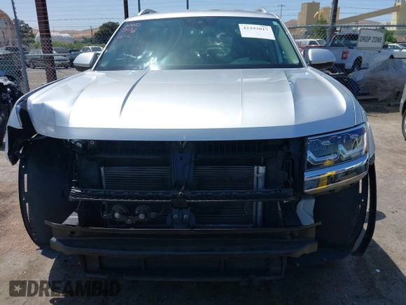 2018 Volkswagen Atlas SE with VIN 1V2DP2CA3JC599181, listed as a IAAI auction lot 42293017 with 70,589 mi miles and . Bid and sale history available at DreamBid. Image 13.