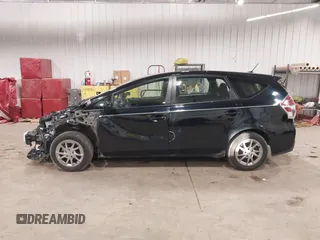 2017 Toyota Prius v Two with VIN JTDZN3EU0HJ063367, listed as a IAAI auction lot 40834930 with 153,045 mi miles. Bid and sale history available at carsss.com. Image 14.
