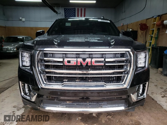 2024 GMC Yukon SLT with VIN 1GKS2BKDXRR331079, listed as a Copart auction lot 79533764 with 8,233 mi miles and Clean Title. Bid and sale history available at carsss.com. Image 5.
