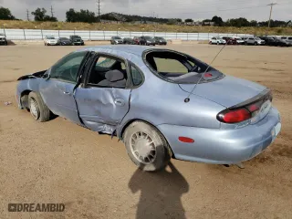 1998 Ford Taurus SE Comfort with VIN 1FAFP53S7WG223397, listed as a Copart auction lot 74794624 with 76,614 mi miles and Salvage Title. Bid and sale history available at carsss.com. Image 2.