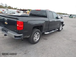 2016 Chevrolet Silverado 1500 LT with VIN 1GCRCREC7GZ109079, listed as a IAAI auction lot 40985730 with 162,630 mi miles. Bid and sale history available at carsss.com. Image 4.