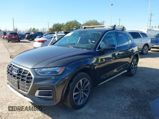 2021 Audi Q5 Premium Plus z VIN WA1BAAFY6M2013249, wystawiony jako IAAI lot #38681569 z przebiegiem 68 694 mil mil oraz . Historia ofert i sprzedaży dostępna na DreamBid. Obrazek 17.