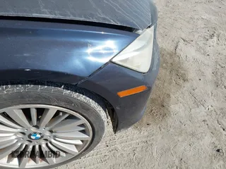 2014 BMW 3 Series 335i with VIN WBA3A9C54EF477943, listed as a IAAI auction lot 41632554 with 102,273 mi miles. Bid and sale history available at carsss.com. Image 6.