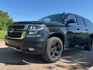 2017 Chevrolet Suburban LT with VIN 1GNSKHKC7HR377710, listed as a Copart auction lot 55876385 with 149,195 mi miles and Clean Title. Bid and sale history available at DreamBid. Image 2.
