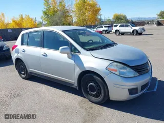2012 Nissan Versa S with VIN 3N1BC1CP7CK246395, listed as a IAAI auction lot 40651303 with 113,764 mi miles. Bid and sale history available at carsss.com. Image 1.