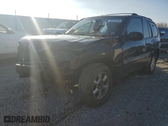 2003 GMC Envoy SLT with VIN 1GKDT13S532288817, listed as a Copart auction lot 85781094 with 0 mi miles and Salvage Title. Bid and sale history available at carsss.com. Image 1.