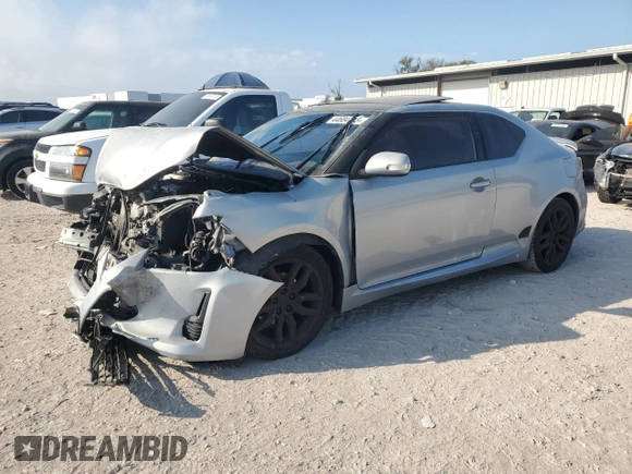 2014 Scion tC with VIN JTKJF5C7XE3068331, listed as a Copart auction lot 44684715 with 141,621 mi miles and Salvage Title. Bid and sale history available at carsss.com. Image 1.
