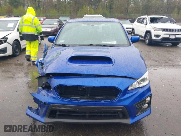 2021 Subaru WRX Premium z VIN JF1VA1C6XM9818786, wystawiony jako IAAI lot #42182203 z przebiegiem 52 535 mil mil oraz . Historia ofert i sprzedaży dostępna na DreamBid. Obrazek 13.