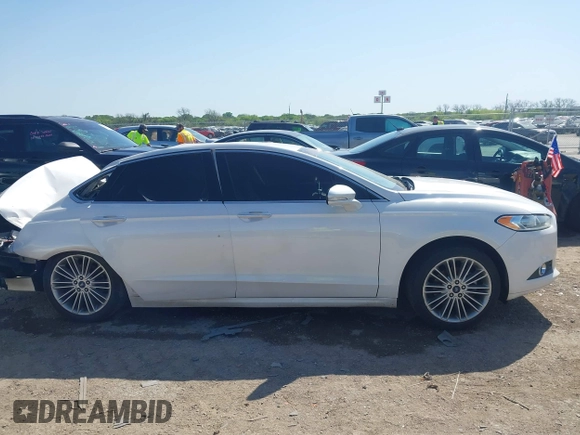 2016 Ford Fusion SE with VIN 3FA6P0T97GR239612, listed as a IAAI auction lot 42009642 with 156,659 mi miles and . Bid and sale history available at DreamBid. Image 13.