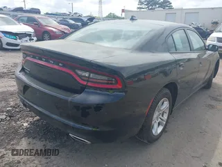 2023 Dodge Charger SXT z VIN 2C3CDXBG8PH607746, wystawiony jako IAAI lot #41856107 z przebiegiem 42 519 mil mil oraz . Historia ofert i sprzedaży dostępna na DreamBid. Obrazek 4.