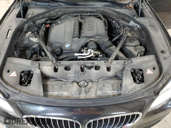 2013 BMW 7 Series 740Li xDrive with VIN WBAYF4C50DD127620, listed as a Copart auction lot 75655904 with 138,033 mi miles and Salvage title. Bid and sale history available at DreamBid. Image 12.