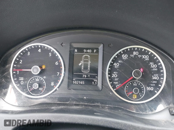 2016 Volkswagen Tiguan S with VIN WVGBV7AXXGW580052, listed as a IAAI auction lot 41444015 with 102,165 mi miles and . Bid and sale history available at DreamBid. Image 7.