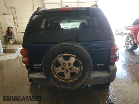 2005 Jeep Liberty Sport with VIN 1J4GL48K65W592215, listed as a Copart auction lot 83214884 with 251,359 mi miles and Salvage Title. Bid and sale history available at carsss.com. Image 6.