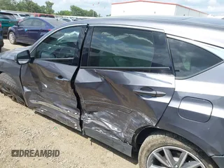 2021 Acura RDX Technology with VIN 5J8TC1H50ML003867, listed as a IAAI auction lot 42150473 with 55,426 mi miles and . Bid and sale history available at DreamBid. Image 14.