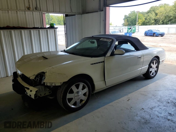 2002 Ford Thunderbird Hardtop Premium z VIN 1FAHP60A52Y130277, wystawiony jako Copart lot #69473594 z przebiegiem Nie podano mil oraz Szkoda całkowita • Salvage title. Historia ofert i sprzedaży dostępna na DreamBid. Obrazek 1.