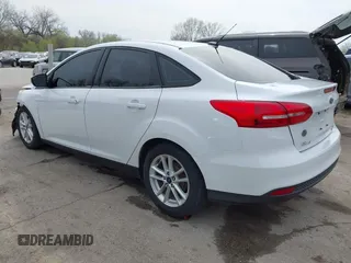 2016 Ford Focus SE with VIN 1FADP3F2XGL324613, listed as a IAAI auction lot 41971597 with 126,738 mi miles. Bid and sale history available at carsss.com. Image 3.