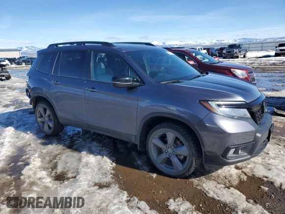 2021 Honda Passport Touring with VIN 5FNYF8H99MB006096, listed as a Copart auction lot 46292925 with 40,809 mi miles and Salvage Title. Bid and sale history available at carsss.com. Image 4.