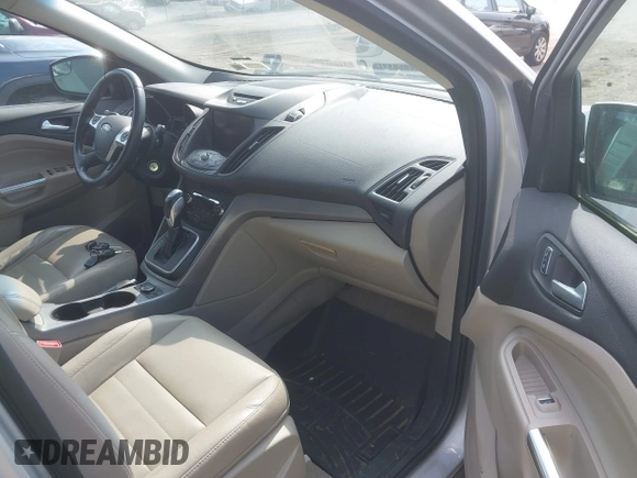 2014 Ford Escape SE z VIN 1FMCU9GX3EUB83978, wystawiony jako IAAI lot #42509549 z przebiegiem 121 388 mil mil oraz . Historia ofert i sprzedaży dostępna na DreamBid. Obrazek 5.