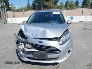 2014 Ford Fiesta SE with VIN 3FADP4EJ8EM121567, listed as a IAAI auction lot 42229439 with 108,640 mi miles and . Bid and sale history available at DreamBid. Image 6.